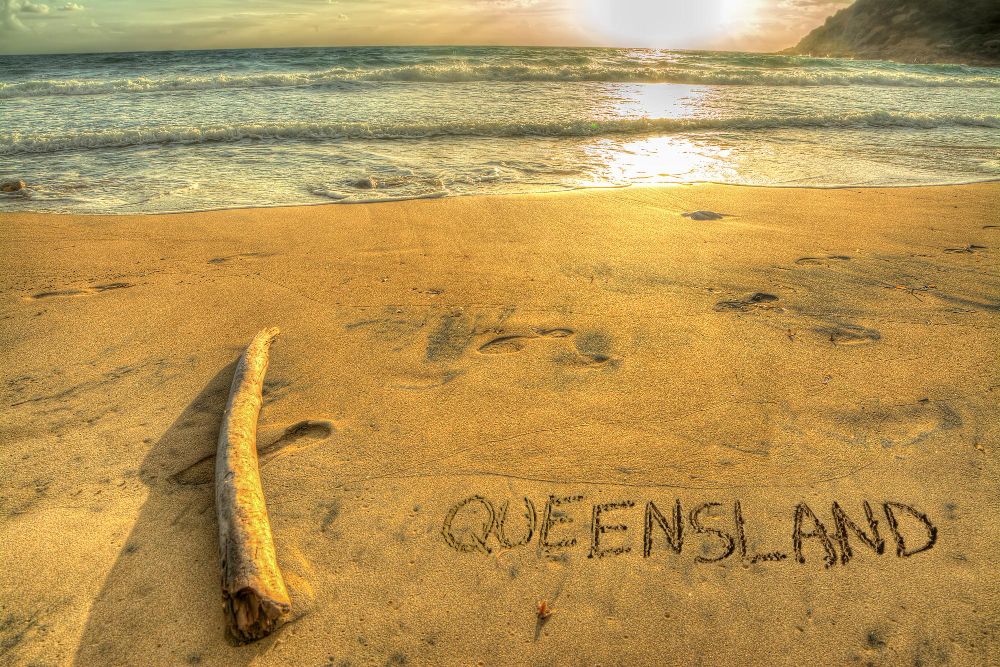 Melbourne Written on a Tropical Beach at Sunset