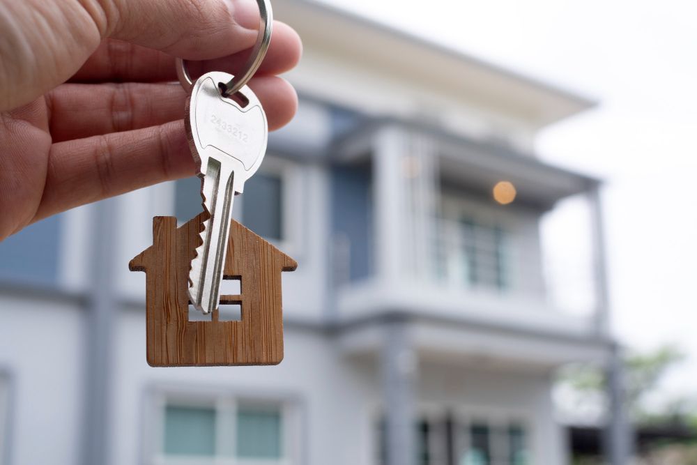 Landlord Unlocks the House Key for New Home