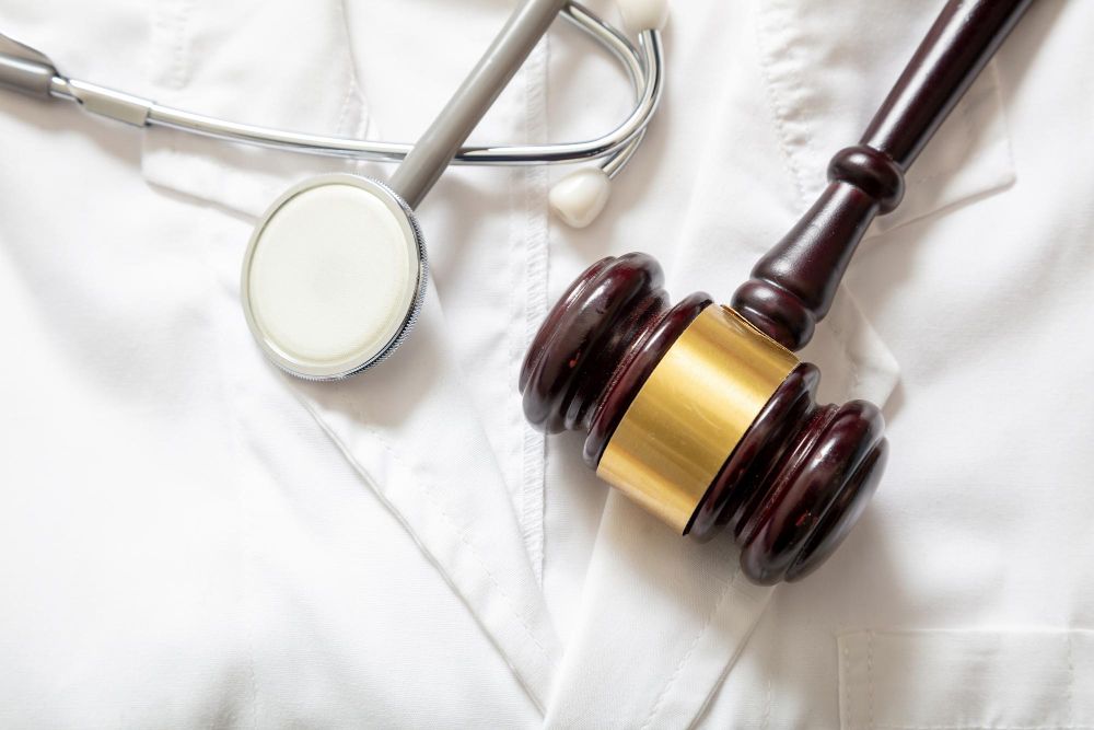 Medical Malpracticehealth and Law Medical Malpractice Personal Injury Lawyer Judge Gavel and Doctor Stethoscope