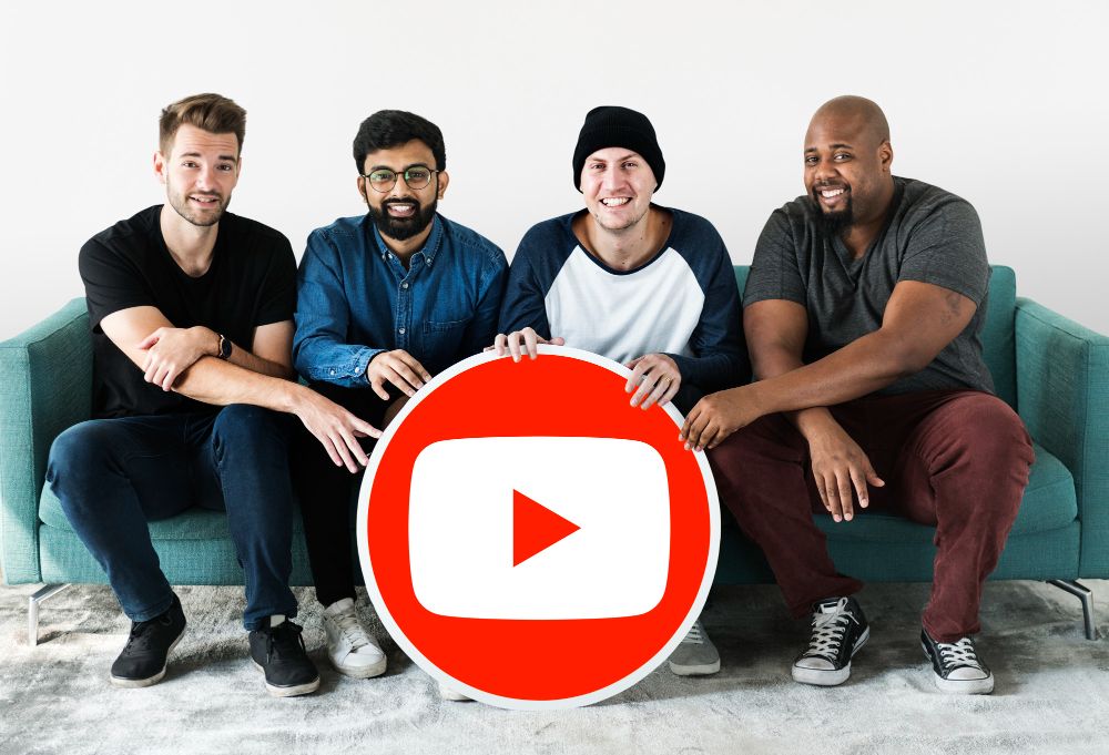 People Holding a YouTube Icon